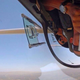 Illustration for article titled Cool photo of a guy pouring some water in an inverted plane